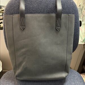 Lulu Dharma tall bag.